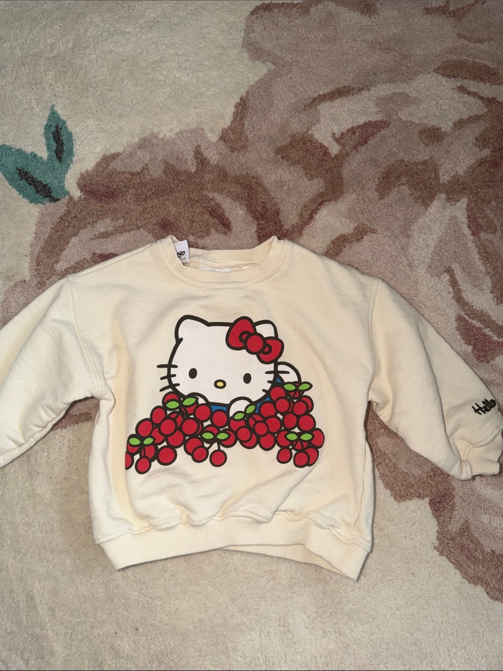 Zara Hello Kitty Cream Sweatshirt with Red Cherry Graphic